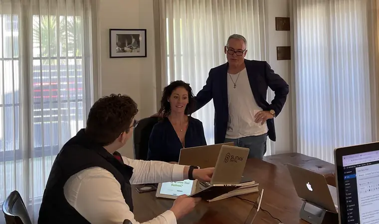 The Slinky team in a strategy meeting at the Perth office with Peter Brittain